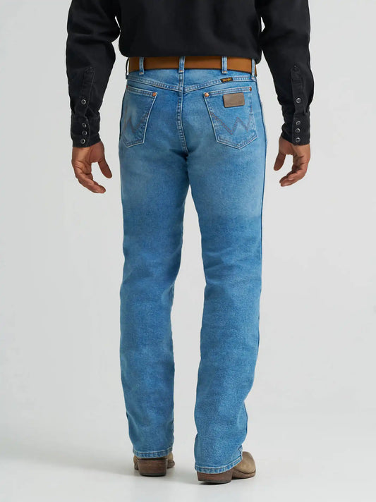 Wrangler® Cowboy Cut® Original Fit Vintage Wash Jean in Mid Blue